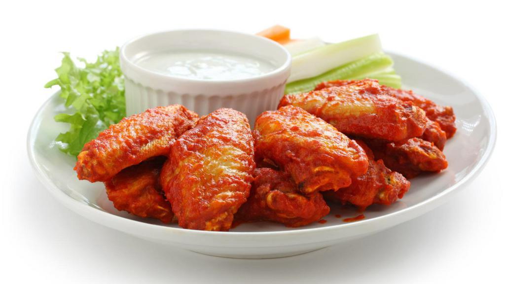 Buffalo Wings (5) · Crispy, golden fried wings smothered in classic, spicy and vinegar Buffalo sauce.