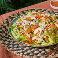 Chinese Chicken Salad · Grilled Chicken, Shredded Carrots, Romaine, Sliced Almonds, Asian Sesame Vinaigrette.