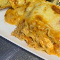 Large  Chicken Lasagna -  (Approx 2 Servings) · Chicken. Include  2 units garlic bread.
