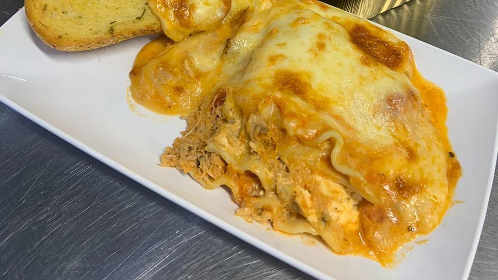 Large  Chicken Lasagna -  (Approx 2 Servings) · Chicken. Include  2 units garlic bread.