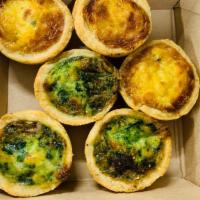 Mini Quiches 6 Units · Flaky Pastry Shells filled with Spinach and Swiss ; and three cheese 
6 Quiches: 3 units  Sp...
