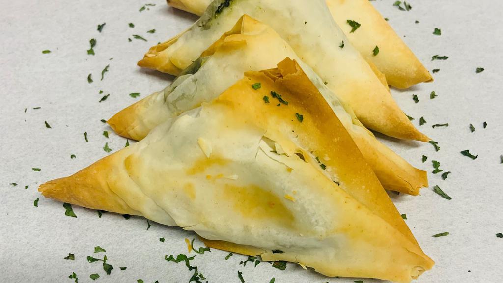 Spanakopita 6 Units · 4 units. Crispy baked phyllo wrapped in flaky phyllo dough stuffed with spinach and a blend of cheese. With pink sauce (ketchup + mayonnaise).