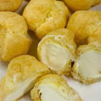 Mini Cream Puffs · 8 units. Whipped cream in a choux pastry shell.