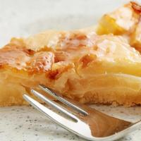 Apple Tart  · A tart filled with sliced apples and sugar.