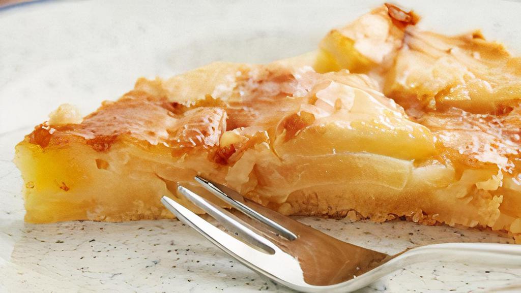 Apple Tart  · A tart filled with sliced apples and sugar.
