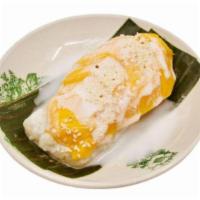 Thai Mango Sticky Rice 泰式芒果罗米饭 · Sweet sticky rice with mango in coconut pandan dressing.