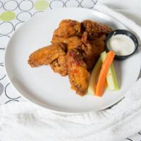 Chicken Wings · Traditional Buffalo or Thai chili.