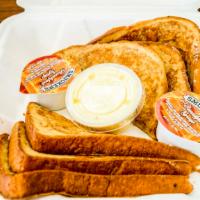 French Toast (3) · Three pieces. with small juice. extra charge for selected items