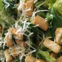 Chicken Caesar Salad · Chopped romaine lettuce, sliced chicken breast, parmesan cheese, and Caesar dressing. Tossed...