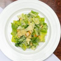 Ceaser Salad · Romaine salad ,croutons ,Parmesan cheese & Caesar dressing.
