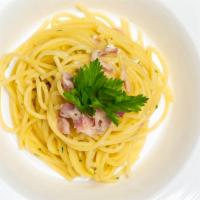 Spaghetti Alla Carbonara · Spaghetti with pork cheek, pecorino romano, egg yolk and black pepper