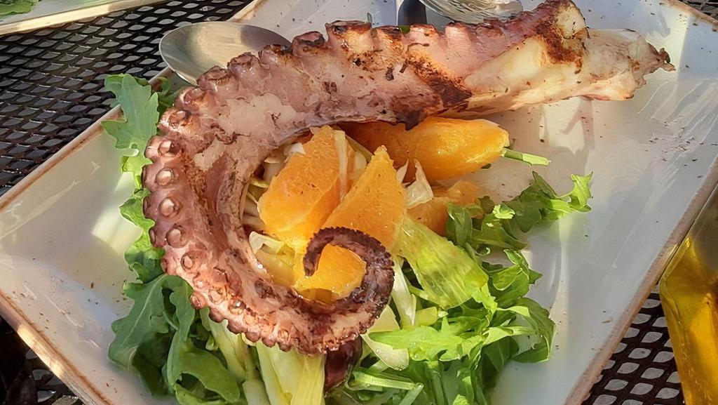 Grilled Octopus · Served over a fregola salad mixed with cherry tomato, olives, arugula, and EVOO.