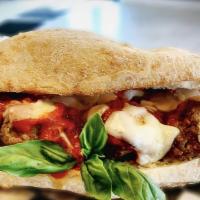 Meatball Parm · Meatballs, melted mozzarella, and tomato sauce.