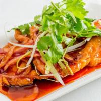 Peking Pork Chops · Fried porkchops sauteed in sweet and sour sauce.