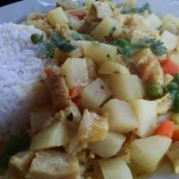 Cau Cau · Tripe stew with potatoes and rice.