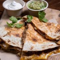 Quesadilla Platter · topped with triple cheeses served with salsa, sour cream and side of fries