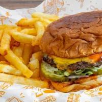 Classic Cheeseburger + Fries · Standard toppings: Lettuce, tomatoes, mayo,ketchup, onions, pickles and american cheese and ...