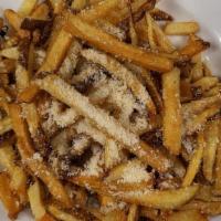Truffled Fries · House cut fries seasoned & tossed with truffle oil & parmesan cheese.