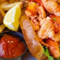 Classic Lobster Roll · 5 oz Fresh Maine lobster on a toasted  . brioche bun served with hand - cut fries
