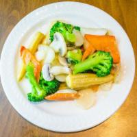 Sauteed Mix Vegetables · Baby corn, mushroom, cabbage, and zucchini. Served with white rice.