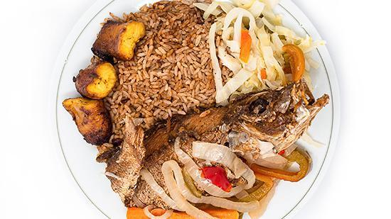 Red Snapper Fish · Fish fried, served escoveitch style or brown stew. Served with rice and peas or white rice, and steamed vegetables.