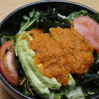 Ariyoshi Salad · Large green salad with avocado and seaweed.