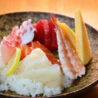 Chirashi · Assorted sliced raw fish over vinegar rice. Served with miso soup.