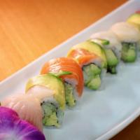 Rainbow Roll · Eight pieces of california roll and cucumber wrapped with tuna, salmon, and whitefish.