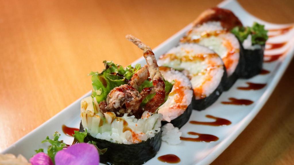 Spider Roll · Five pieces. Deep fried soft shell crab, cucumber, and masago.