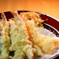 Tempura · Deep fried shrimp and vegetables. Served with rice and soup or salad.