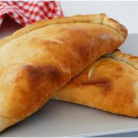 Calzone · Ricotta and mozzarella cheeses and 1 topping of your choice.