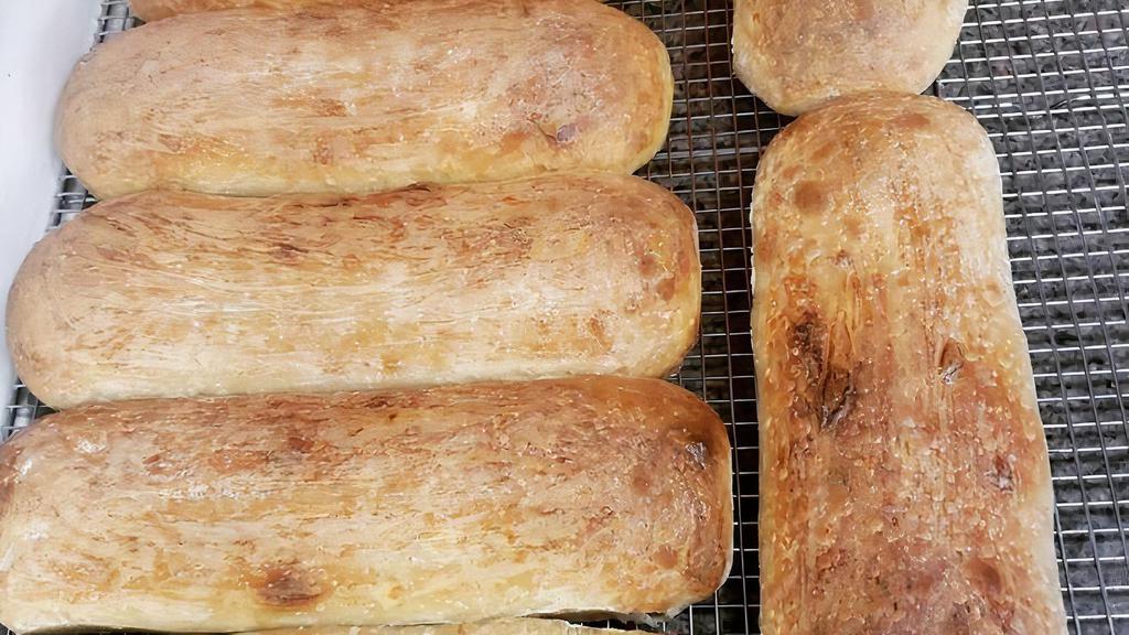 Garlic Bread · ~ loaf of house made garlic bread