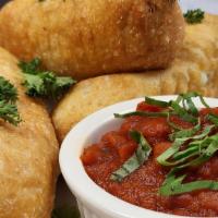 Pane Al Formaggio · ~ deep fired dough stuffed with mozzarella cheese with a side of marinara sauce. 3 to an order