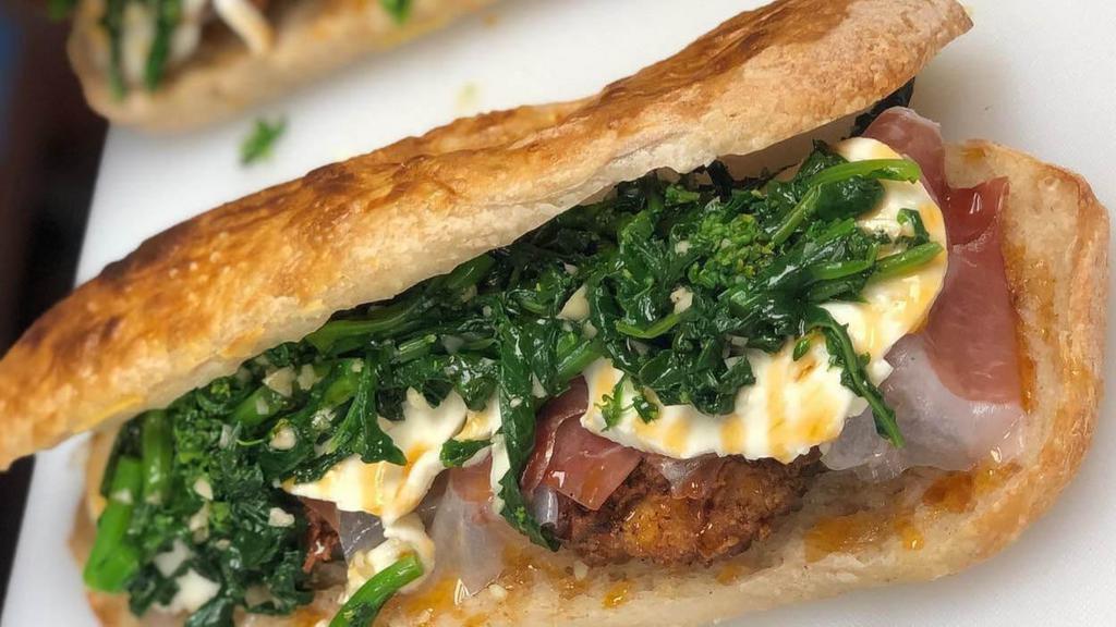 4 Bros Classic Sandwich · ~ chicken cutlet, broccoli rabe, prosciutto, house made fresh mozzarella, and a drizzle of mike's hot honey & garlic oil on house made bread