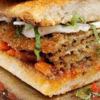 Eggplant & Roasted Red Peppers Sandwich · ~ breaded eggplant, roasted red peppers, fresh garlic, house made fresh mozzarella, red onio...