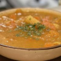 Soup Joumou · Haitian Independence Day Special, Served Year Round. Pumpkin & Vegetable Base.