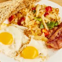 Breakfast Platter Breakfast · Two eggs any style, choice of any meat and home fries and choice of toast.