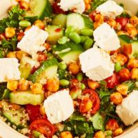 Mediterranean Spa Salad · Organic quinoa, shredded kale, cherry tomatoes, local feta cheese, edamame, slow-cooked chic...