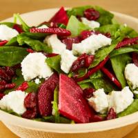 Oh My Goat Salad · Organic baby spinach, dried cranberry, local goat cheese, raw beets and balsamic vinaigrette.