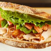 Cali Club · Roasted turkey with artisan butter lettuce, tomatoes, avocado, country bacon and lite mayo o...