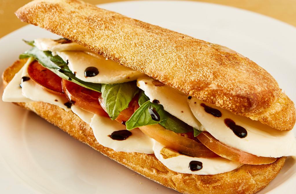 Caprese Panini Sandwich · Fresh mozzarella cheese, basil, tomatoes and balsamic glaze on balthazar semolina flatbread.