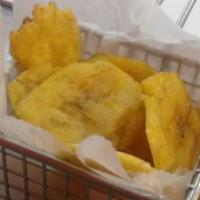 Tostones · Fried plantains.