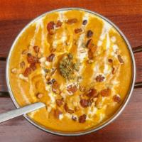 Malai Kofta · Vegetable and cheese dumplings in a nutty tomato sauce.
