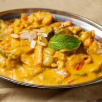Nav-Rattan Korma · Vegetarian, gluten free. Seasonal fresh vegetables cooked in a sauce of cashew nuts, dry fru...