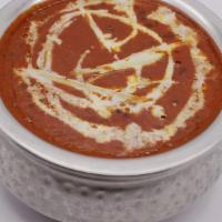 Dal Makhni · Vegetarian, gluten free. An all time favorite; black lentils slow cooked with tomatoes, ging...