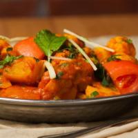 Aloo Gobhee Adrak Masala · Vegetarian, vegan, gluten free. Florets of cauliflower & potatoes tossed in a sauce of tomat...