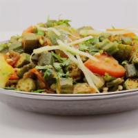 Bhendi Anardana · Vegetarian, vegan, gluten free. Fresh baby okra sauteed with onions, tomato, ginger, garlic,...