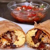 Breakfast Burrito · Eggs, cheese, hash browns, with choice of meat on wrap