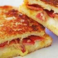 Grilled Cheese, Bacon & Tomato Sandwich · Melted cheese, bacon, and tomato on white on whole wheat.