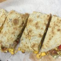 American Wrap- Breakfast · Most popular. Three eggs, crispy bacon, melted American cheese, and mixed greens on wrap.